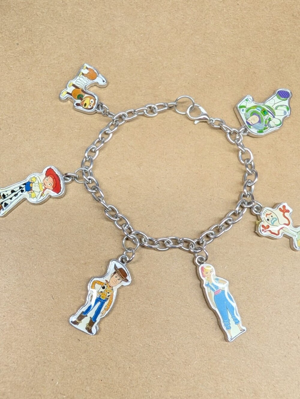 NWOT Girls Womens Toy Story Charm Bracelet Disney Pixar 7.5" Woody Buzz Jessie